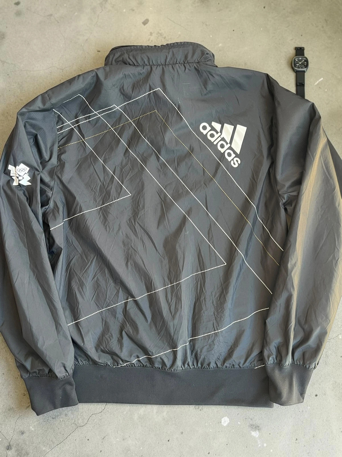 Adidas black bomber jacket reversible London 2012 logo and Olympic detail.