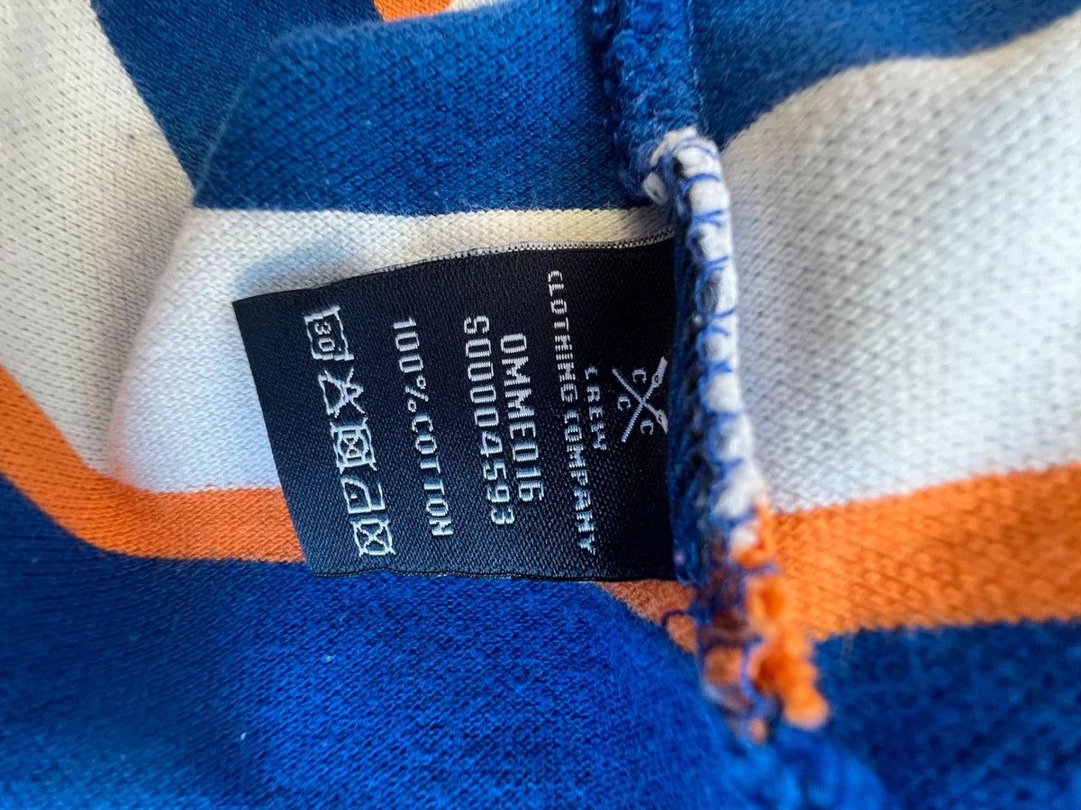 CCC men's polo shirt blue and white striped with orange accents, 100% cotton.