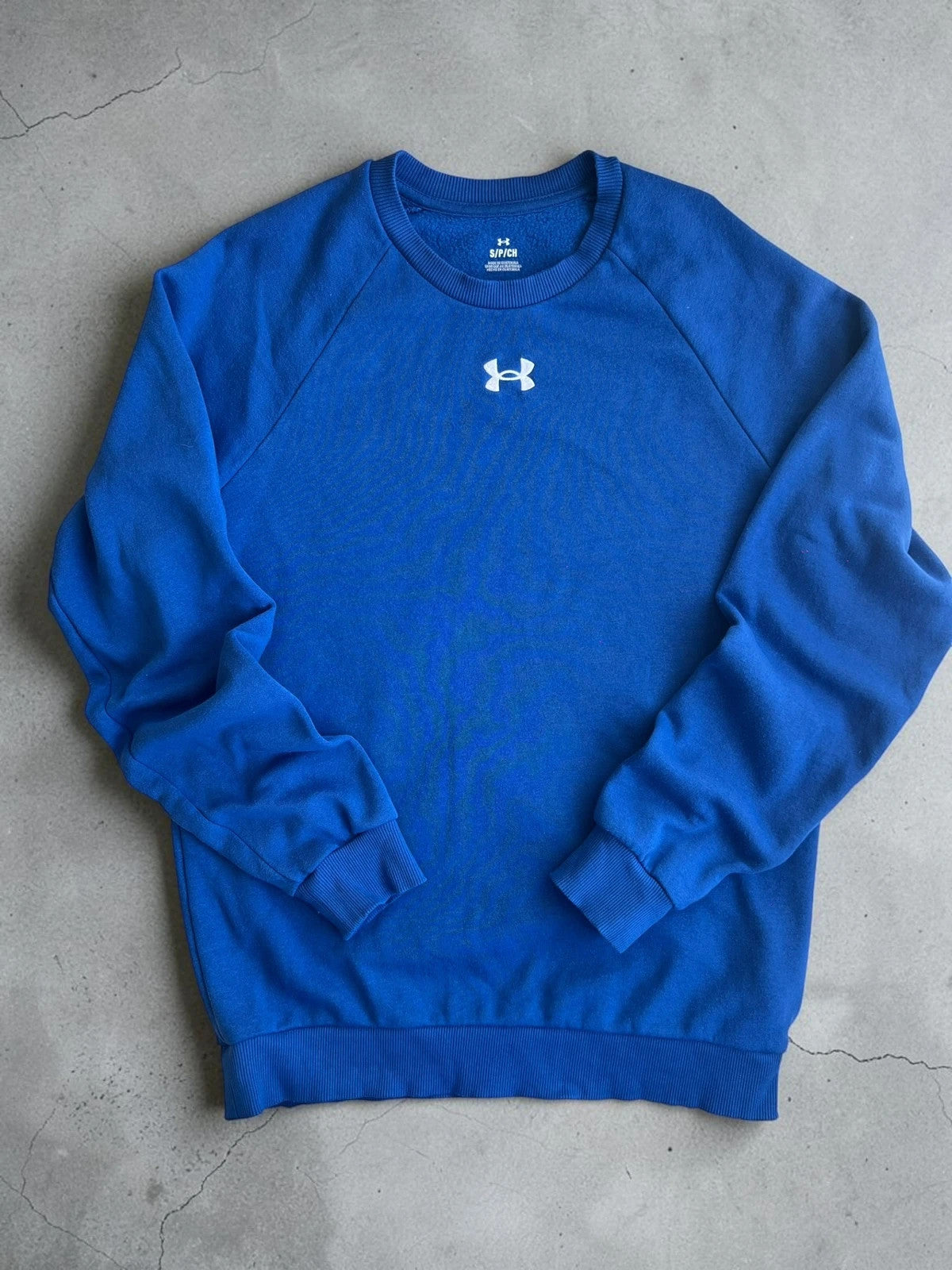 Under Armour blue fleece sweatshirt with embroidered logo, size S, casual gym wear.