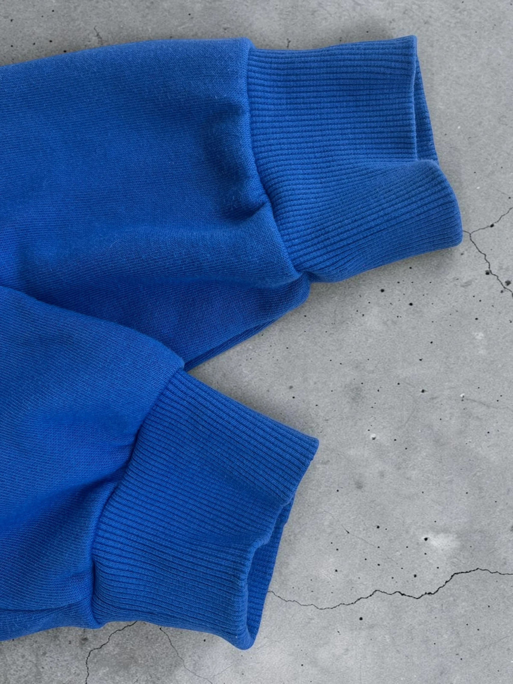 Under Armour blue fleece sweatshirt with embroidered logo, size S, casual gym wear.