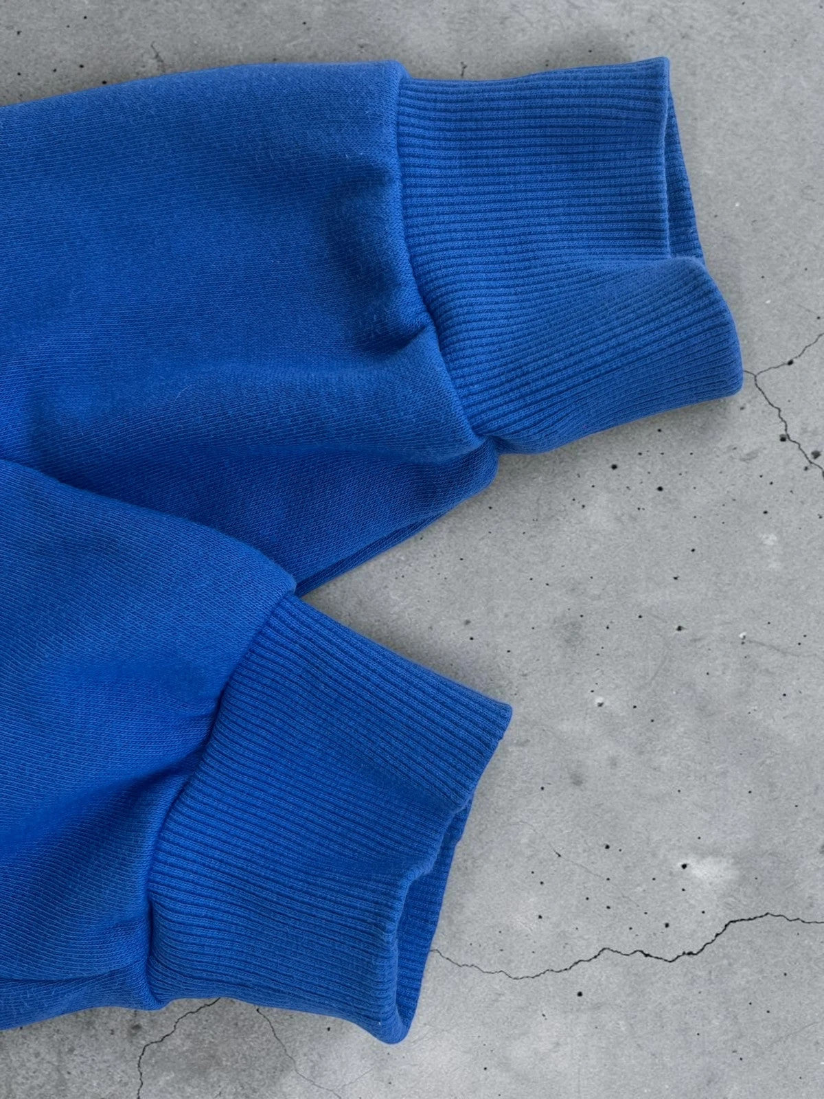 Under Armour blue fleece sweatshirt with embroidered logo, size S, casual gym wear.