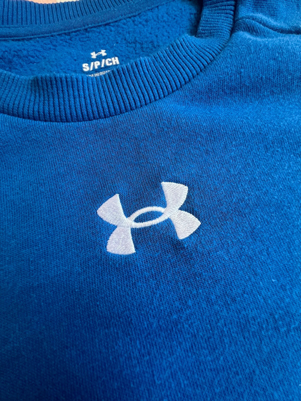 Under Armour blue fleece sweatshirt with embroidered logo, size S, casual gym wear.