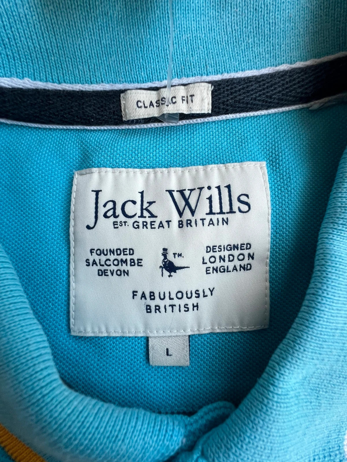 Jack Wills blue polo shirt with yellow collar and sleeve details, classic fit cotton.