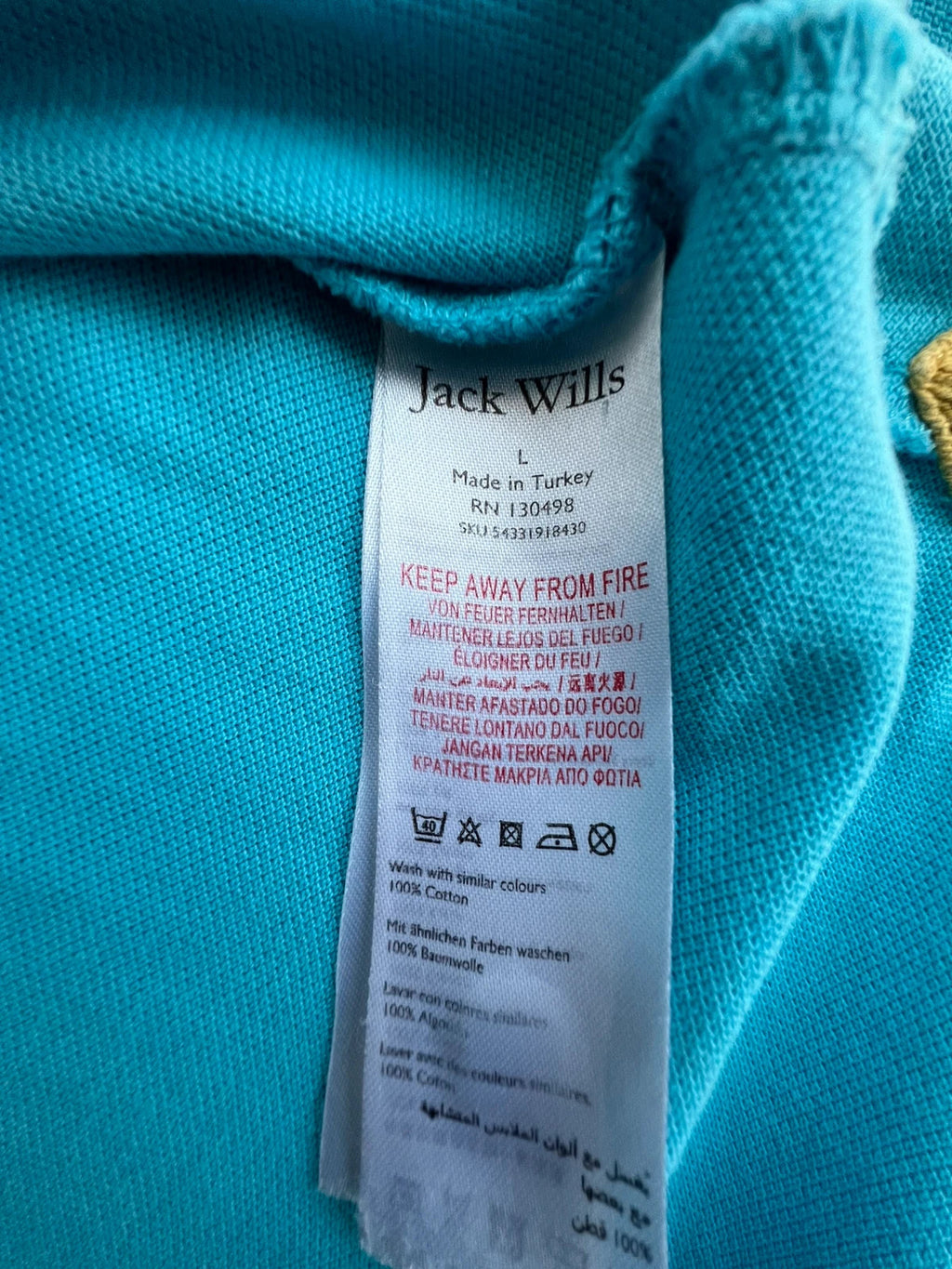 Jack Wills blue polo shirt with yellow collar and sleeve details, classic fit cotton.
