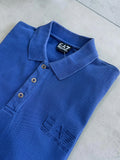 EA7 Emporio Armani blue polo shirt with embroidered logo and classic sporty design.