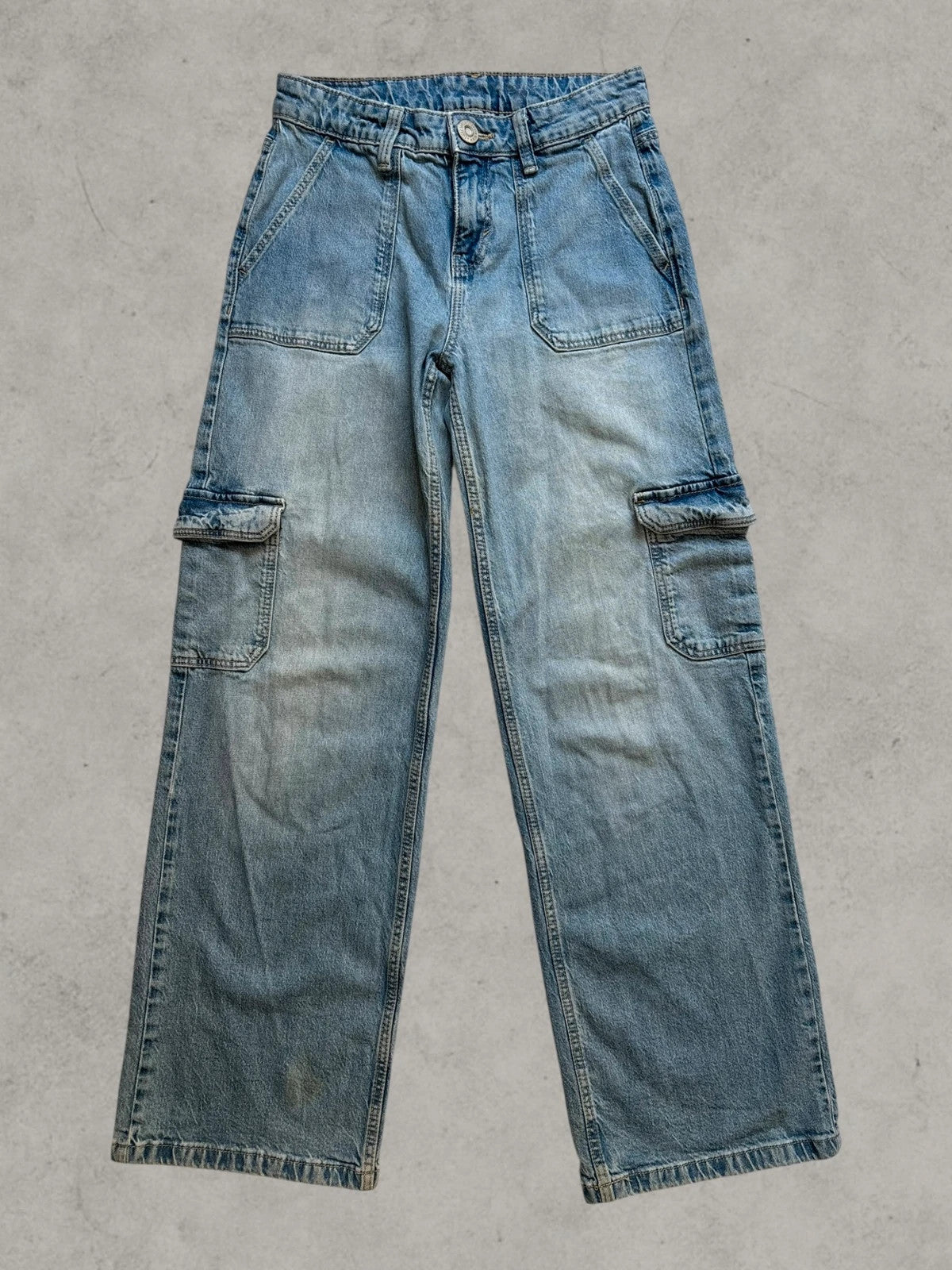 Crafted Quality blue baggy cargo jeans wide leg with side pockets and Y2K style.