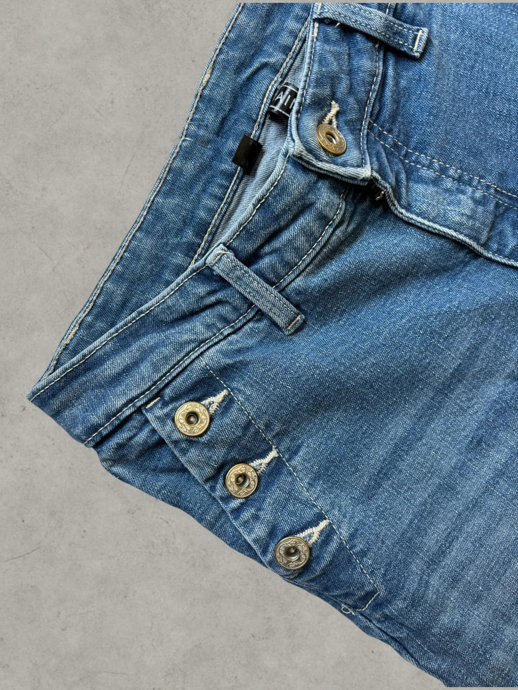 Rainbow blue straight jeans Y2K flare bootcut with decorative front buttons.