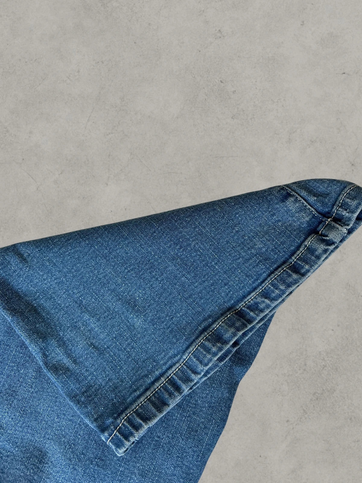 Rainbow blue straight jeans Y2K flare bootcut with decorative front buttons.