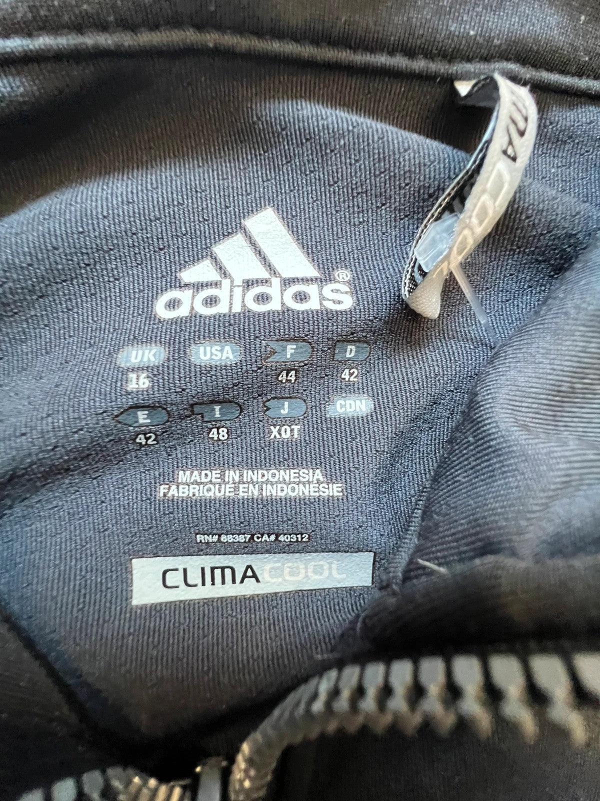 Adidas black sports jacket ClimaCool with reflective details and high collar, size XL.