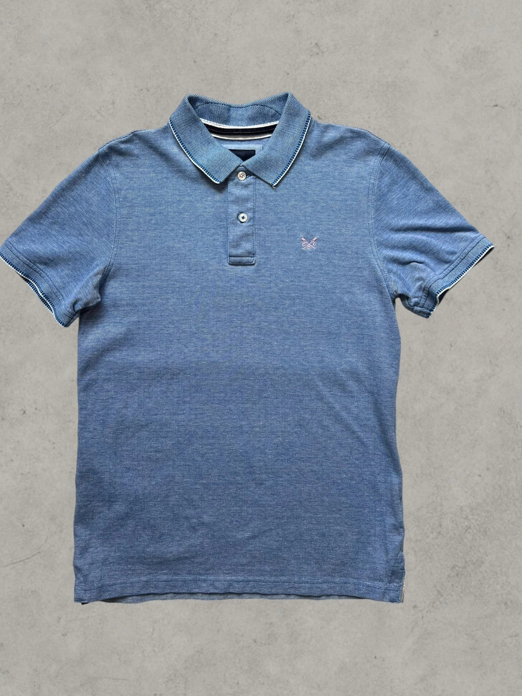 Crew Clothing Company blue polo shirt with embroidered logo and classic piqué fabric.