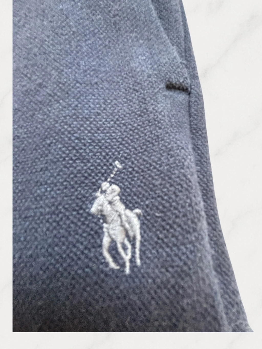 Polo Ralph Lauren navy joggers with embroidered Pony logo and side cargo pockets.