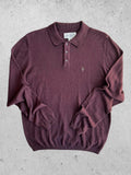 Penguin burgundy jersey polo with button closure and classic collar design.