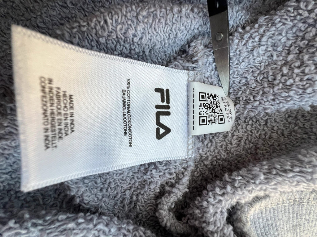 Fila navy sweatshirt with embroidered logo and side branding tapes, 90s retro style.