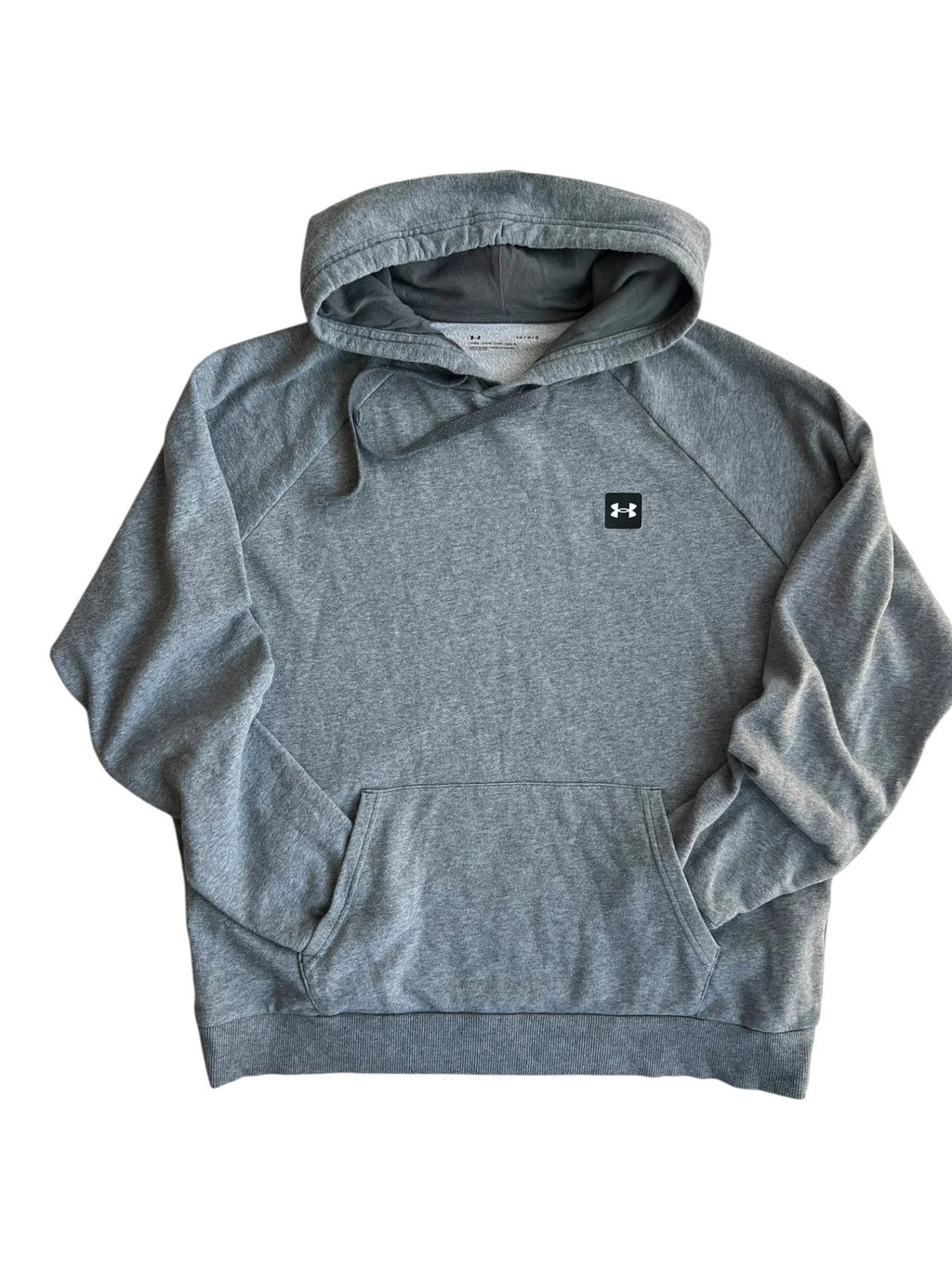 Under Armour grey oversized hoodie with front kangaroo pocket and logo on chest.