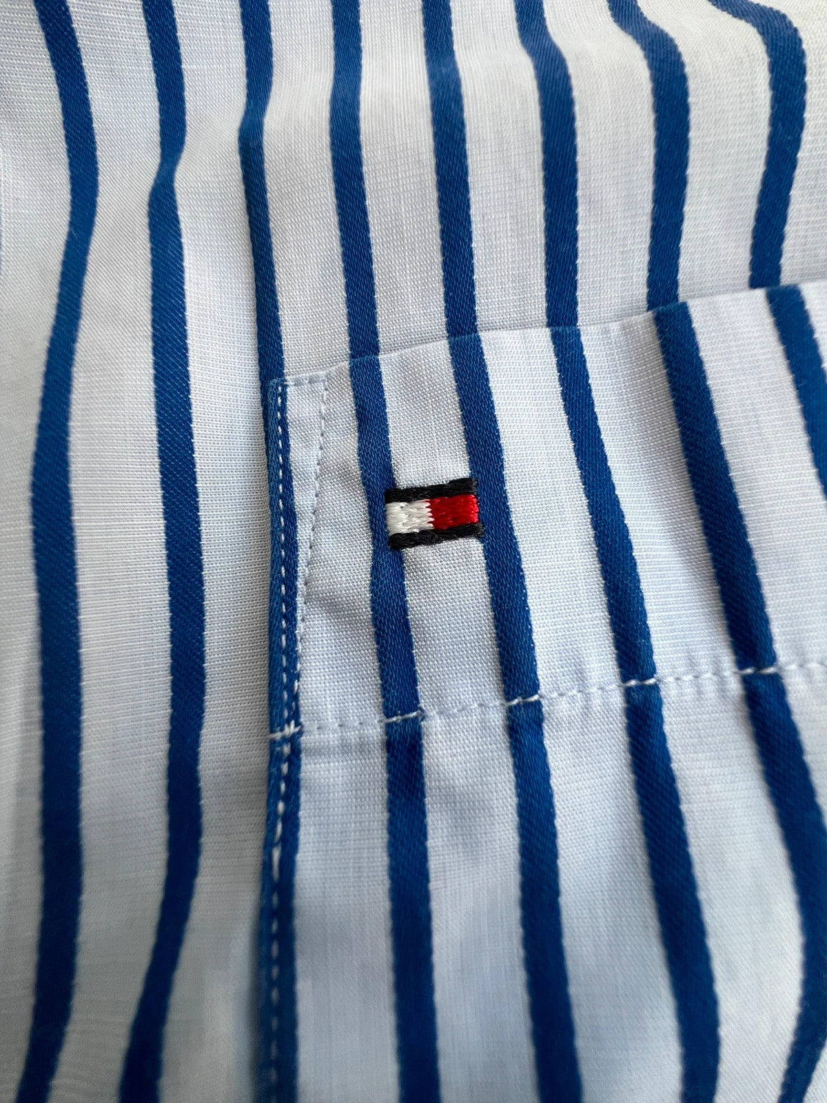 Tommy Hilfiger striped shirt blue and white cotton with embroidered logo and chest pocket.