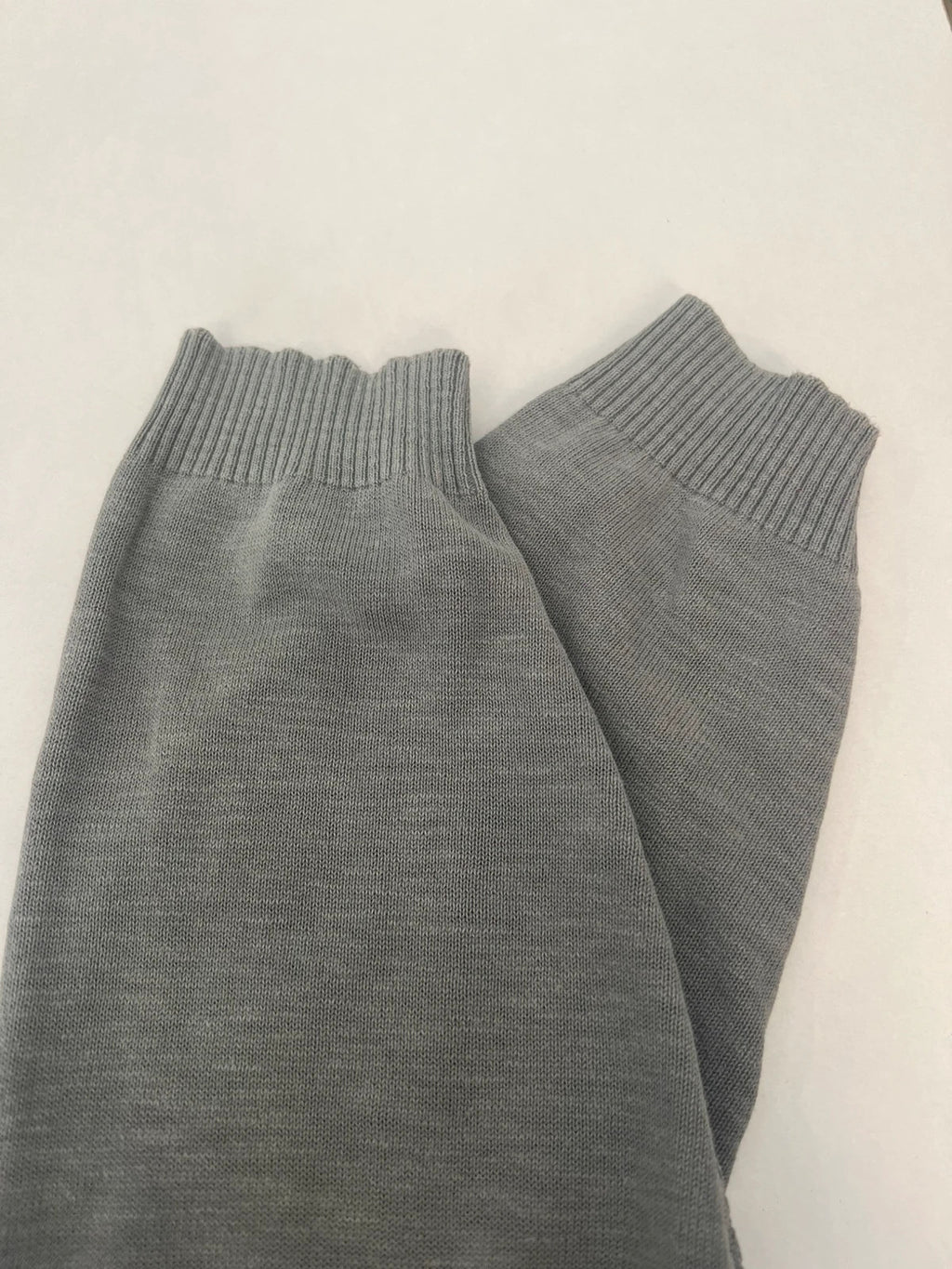 Hugo Boss grey long sleeve polo shirt with open collar and soft cotton fabric.