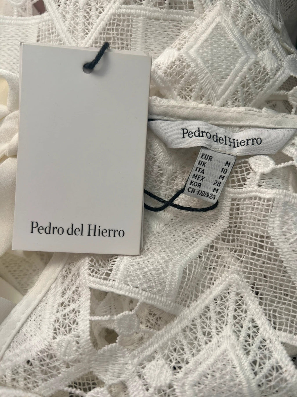 Pedro Del Hierro white lace blouse short sleeves open back tie detail