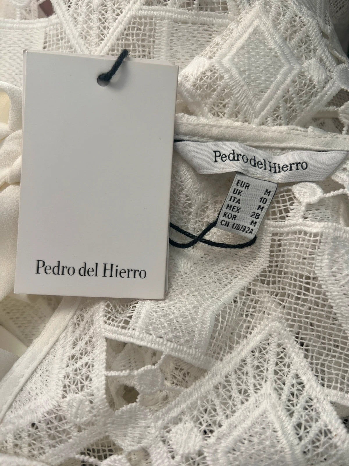 Pedro Del Hierro white lace blouse short sleeves open back tie detail