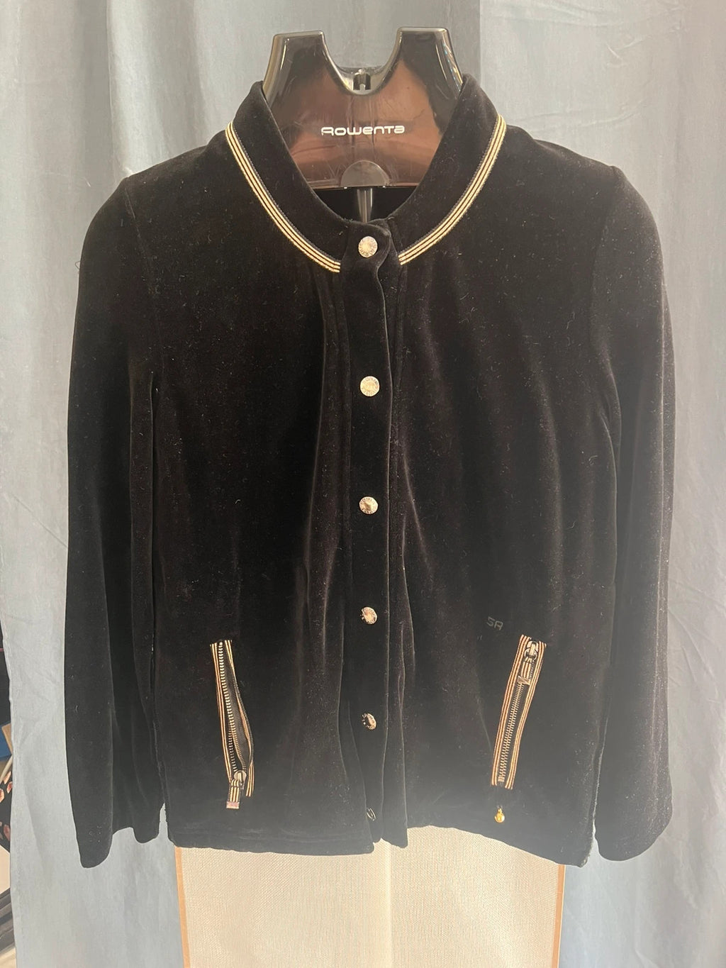 Sonia Rykiel black velvet cardigan with gold details, polo collar and metallic button closure.