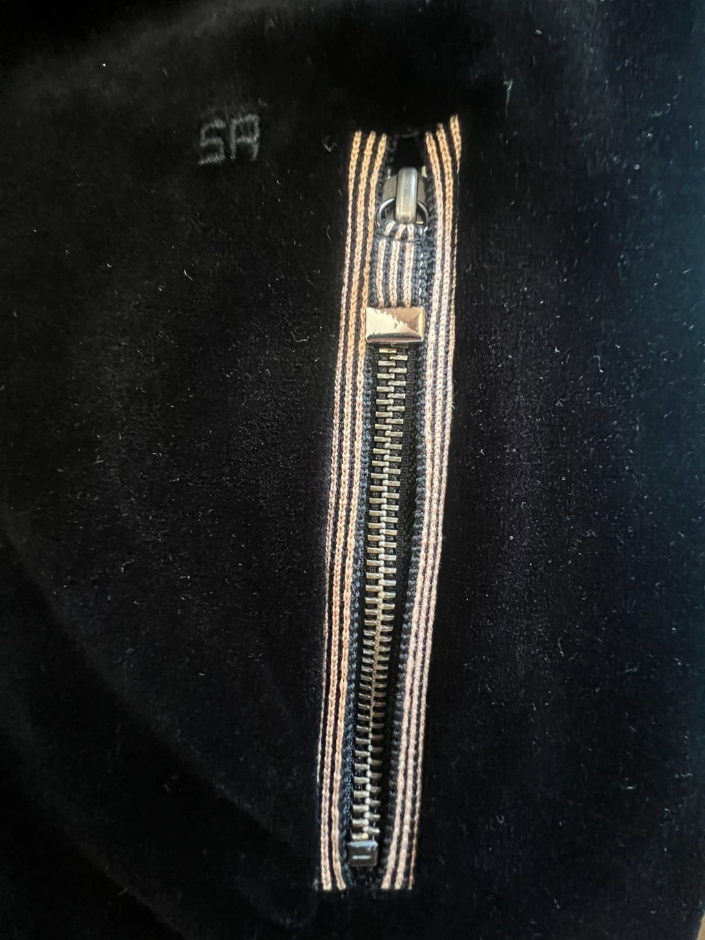 Sonia Rykiel black velvet cardigan with gold details, polo collar and metallic button closure.