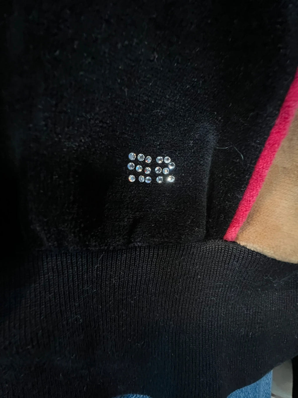 Sonia Rykiel black velour sweatshirt with beige side panels and red piping, rhinestone detail.