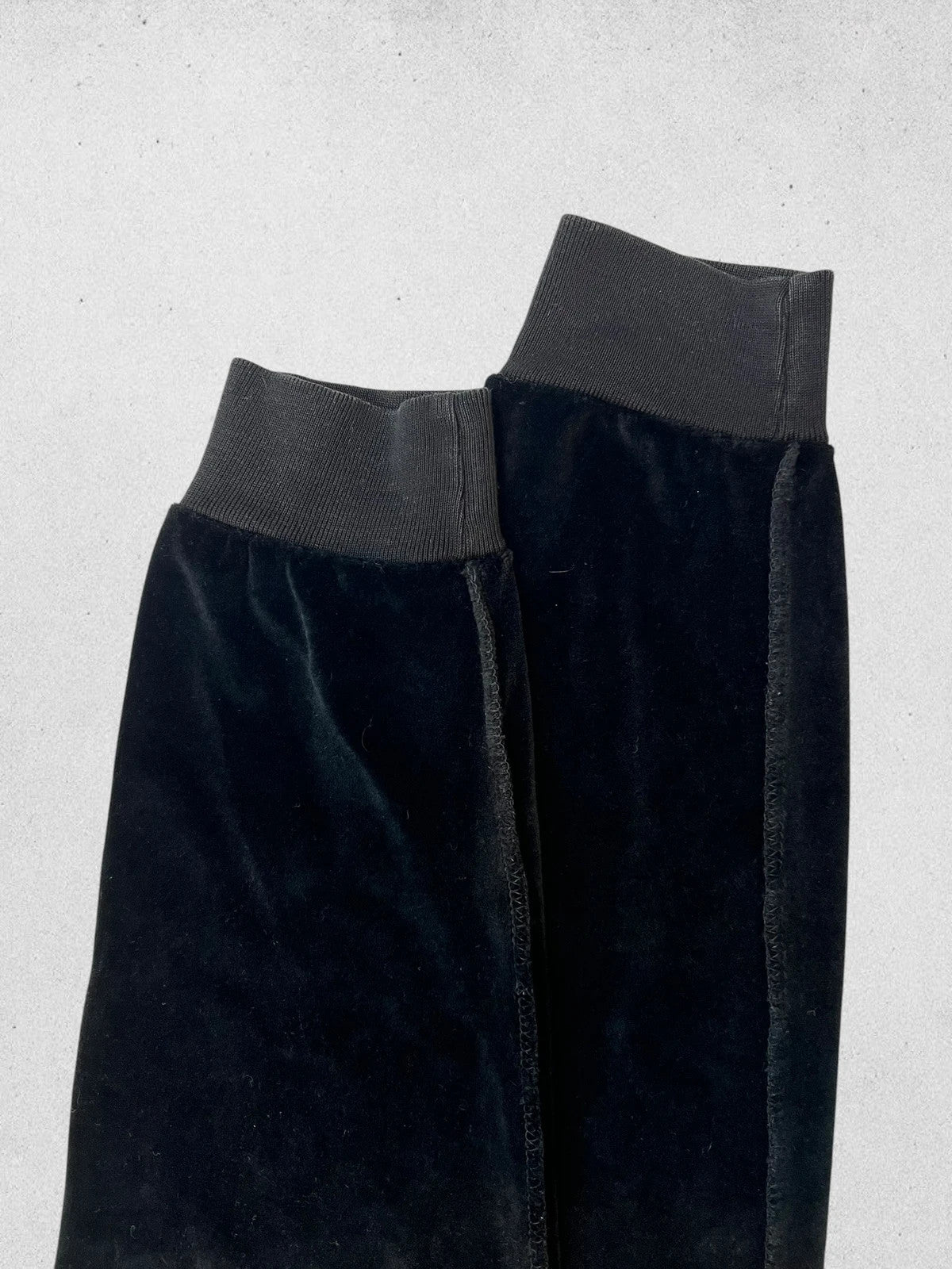 Sonia Rykiel black velour sweatshirt with beige side panels and red piping, rhinestone detail.