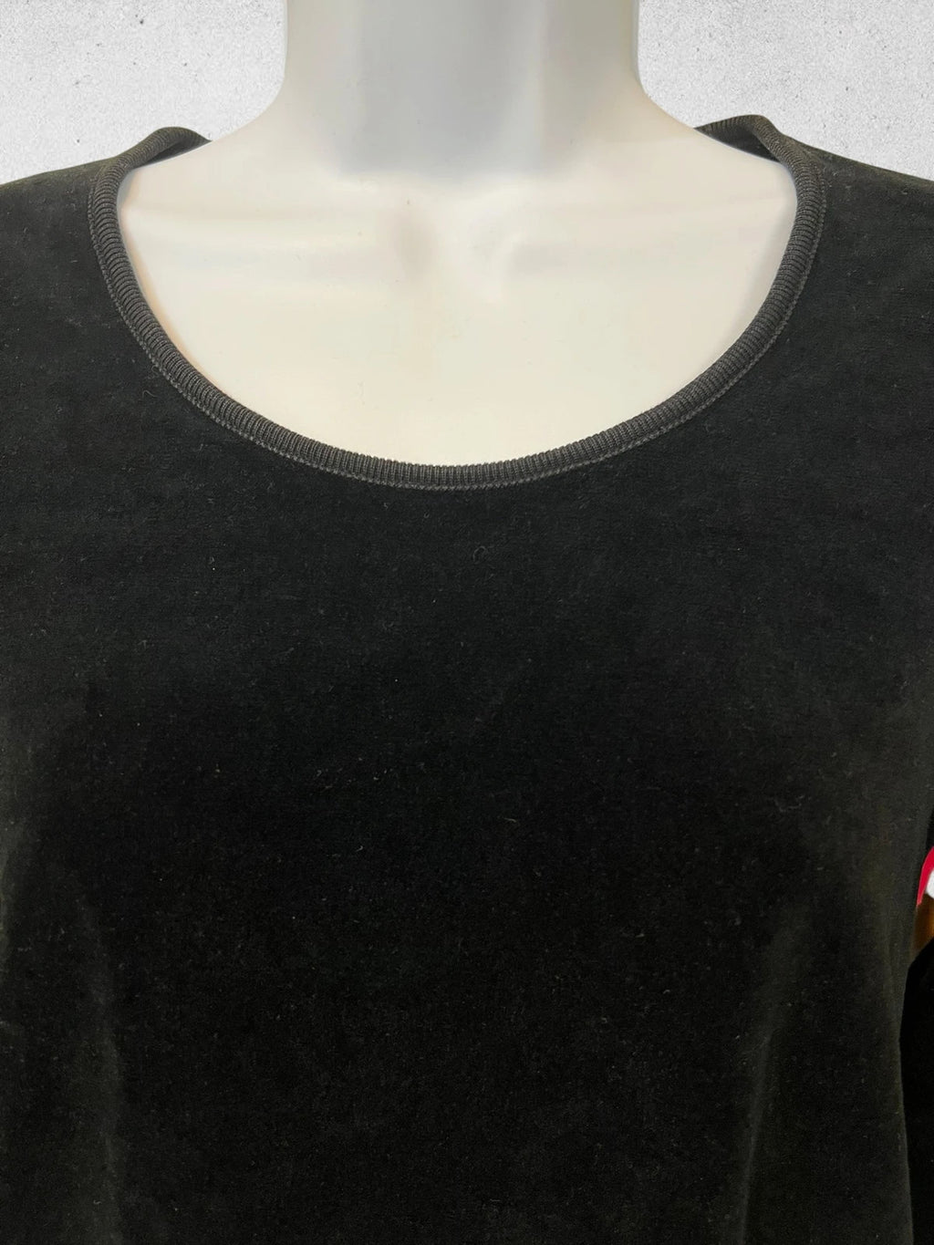 Sonia Rykiel black velour sweatshirt with beige side panels and red piping, rhinestone detail.