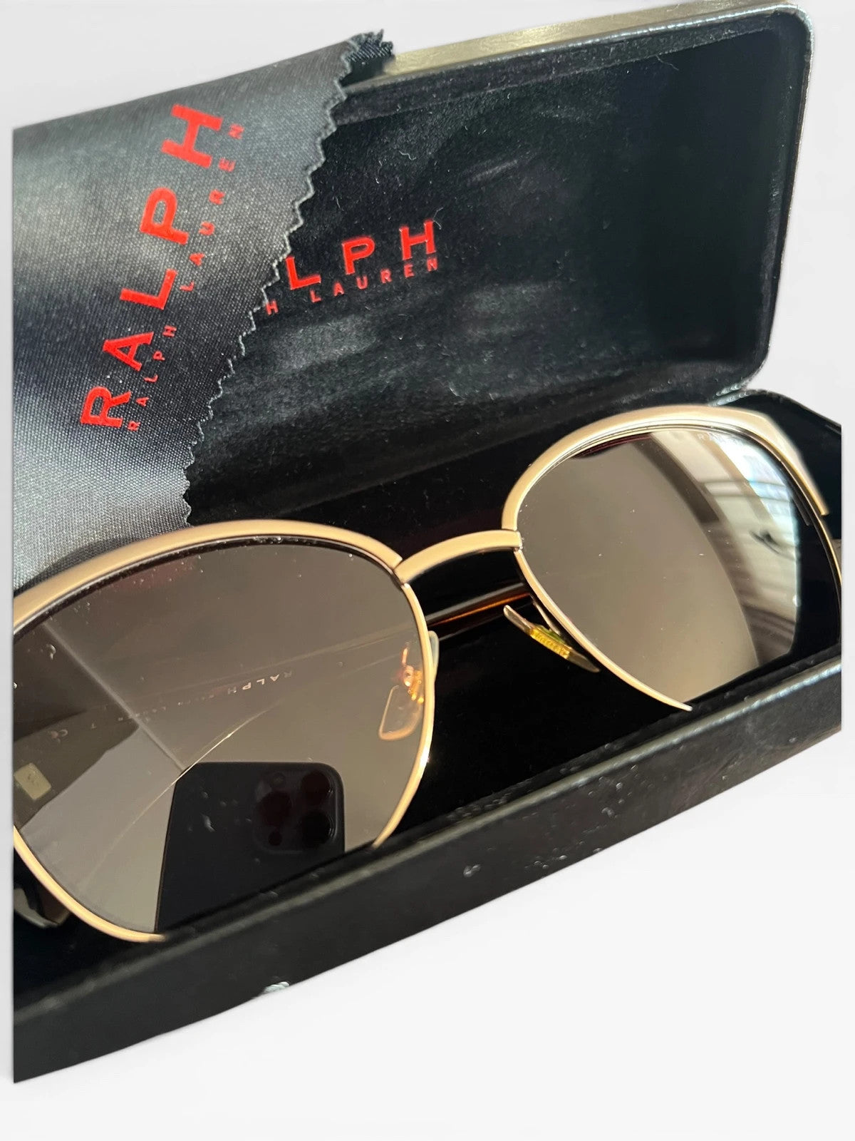 Ralph Lauren Cat Eye sunglasses brown lenses gold and brown frame with logo details.