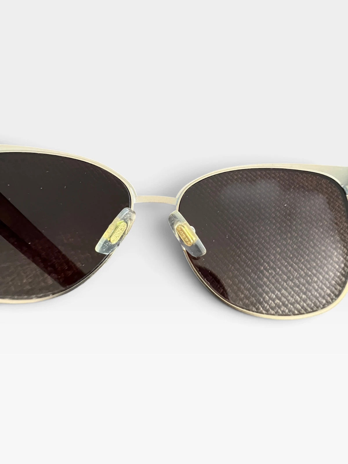 Ralph Lauren Cat Eye sunglasses brown lenses gold and brown frame with logo details.
