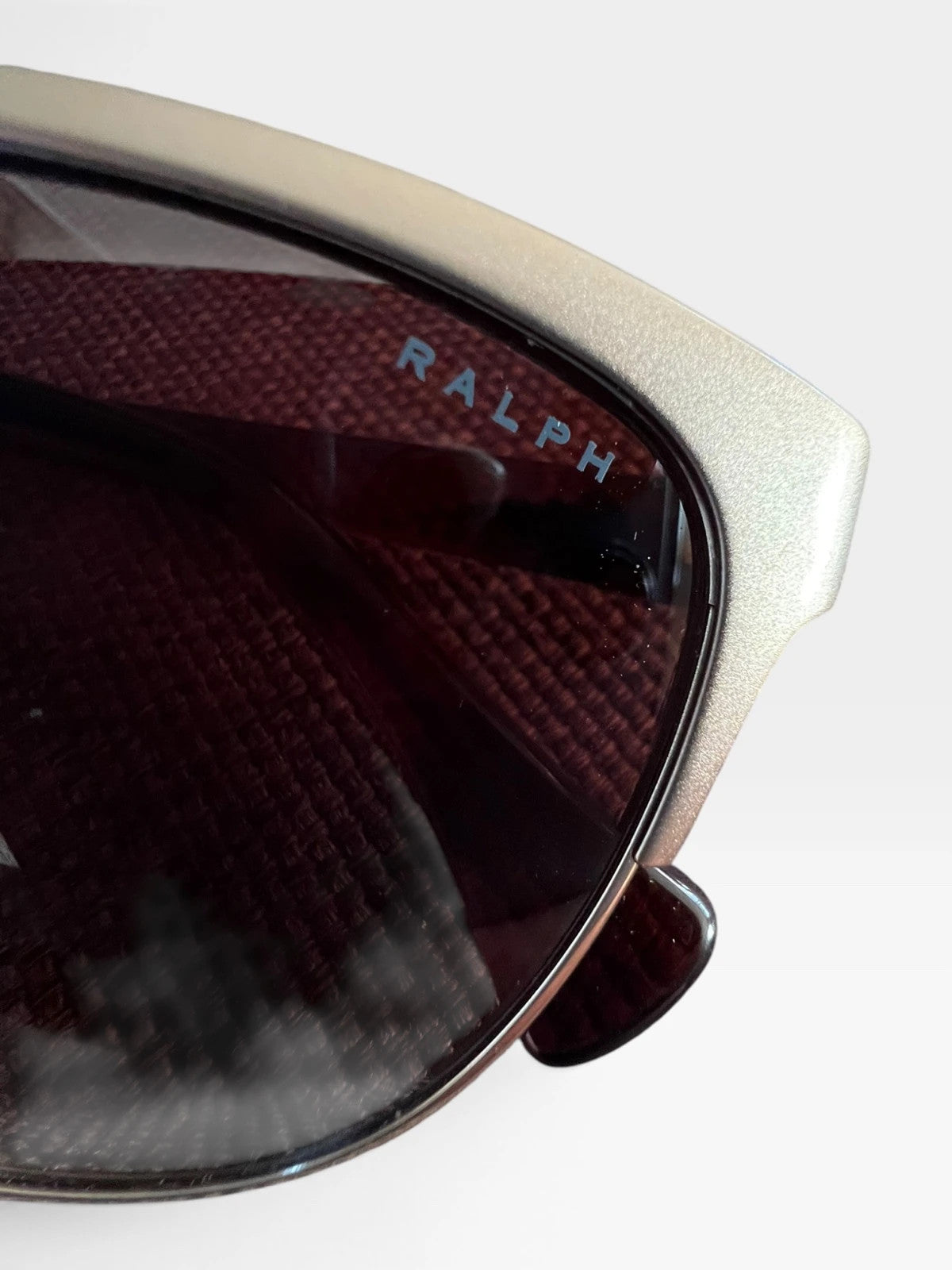 Ralph Lauren Cat Eye sunglasses brown lenses gold and brown frame with logo details.