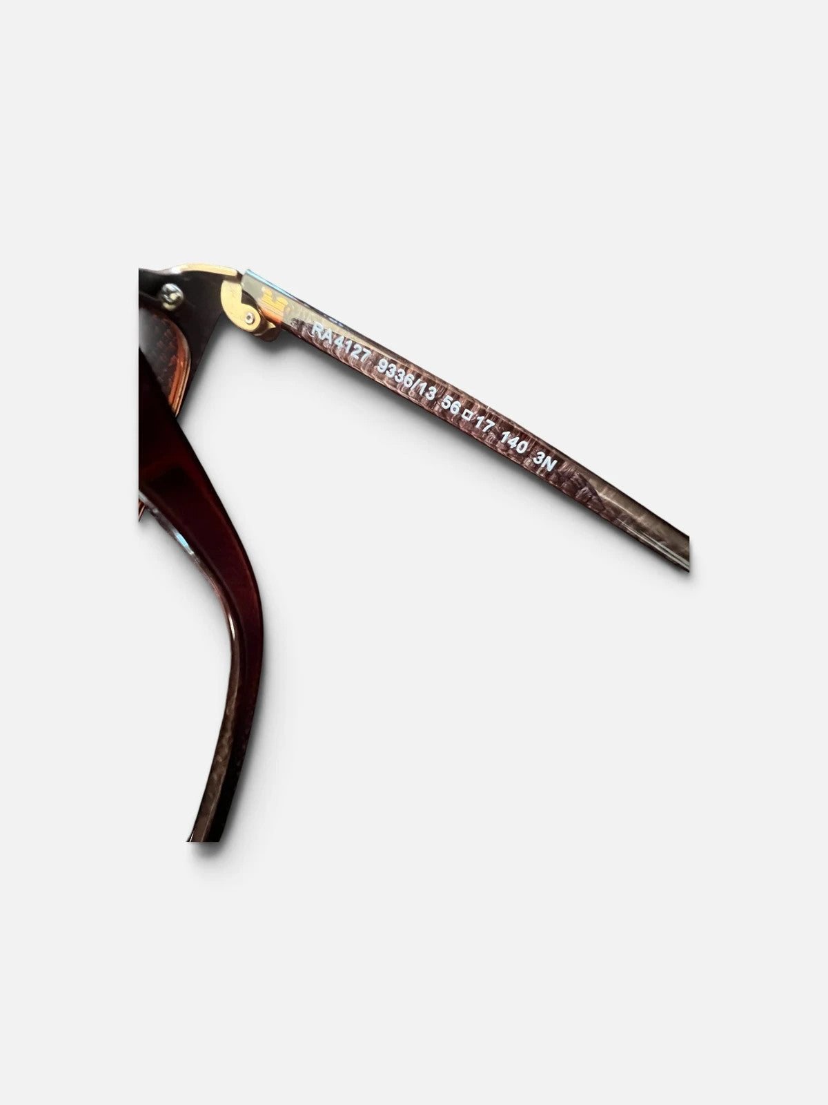 Ralph Lauren Cat Eye sunglasses brown lenses gold and brown frame with logo details.