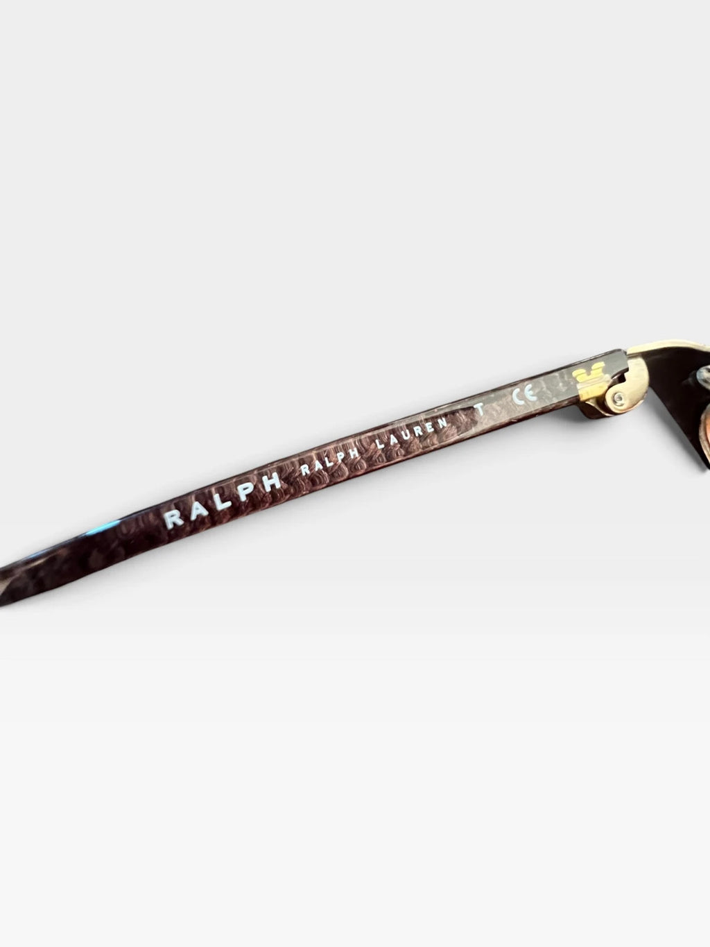 Ralph Lauren Cat Eye sunglasses brown lenses gold and brown frame with logo details.