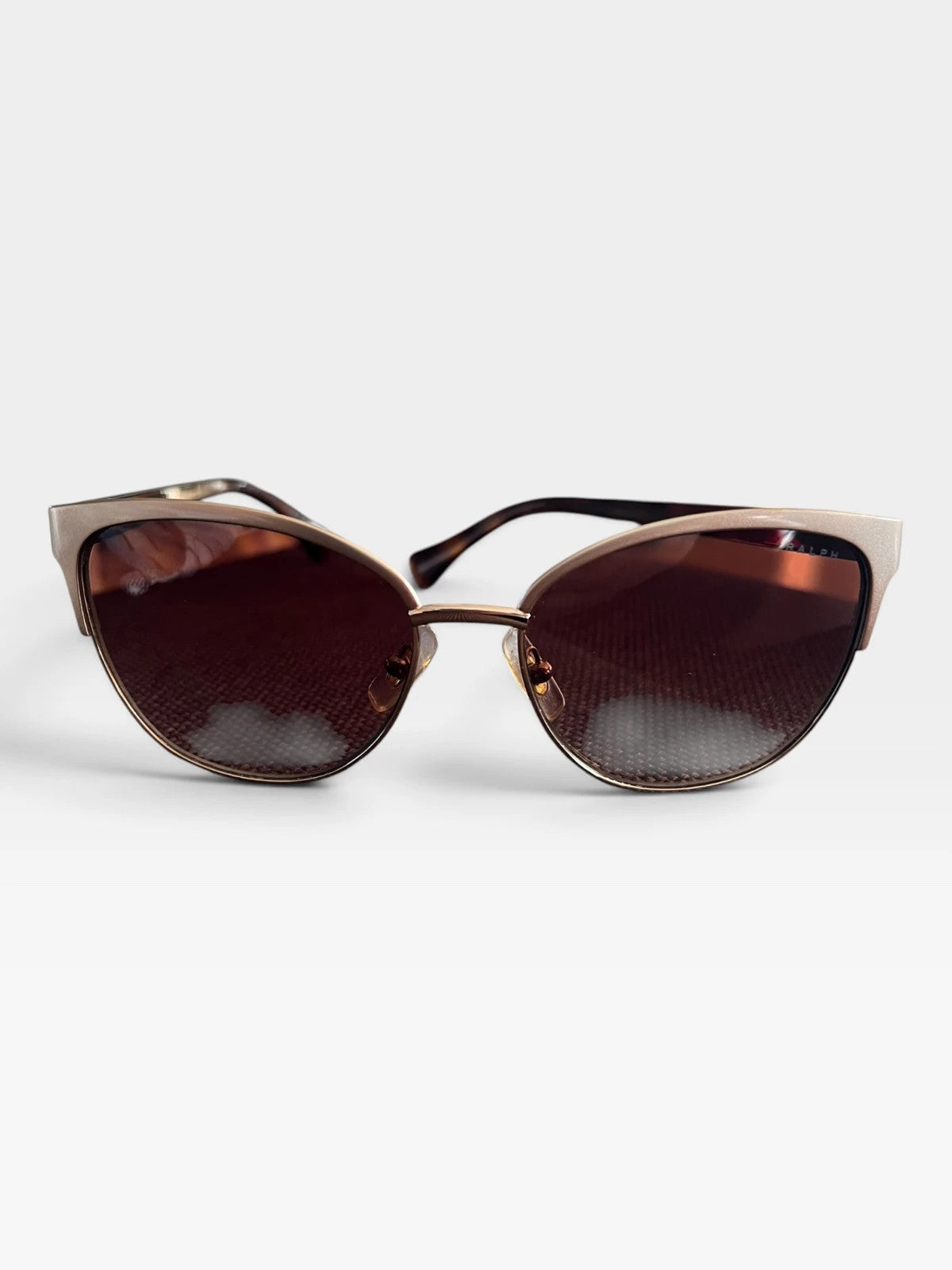 Ralph Lauren Cat Eye sunglasses brown lenses gold and brown frame with logo details.