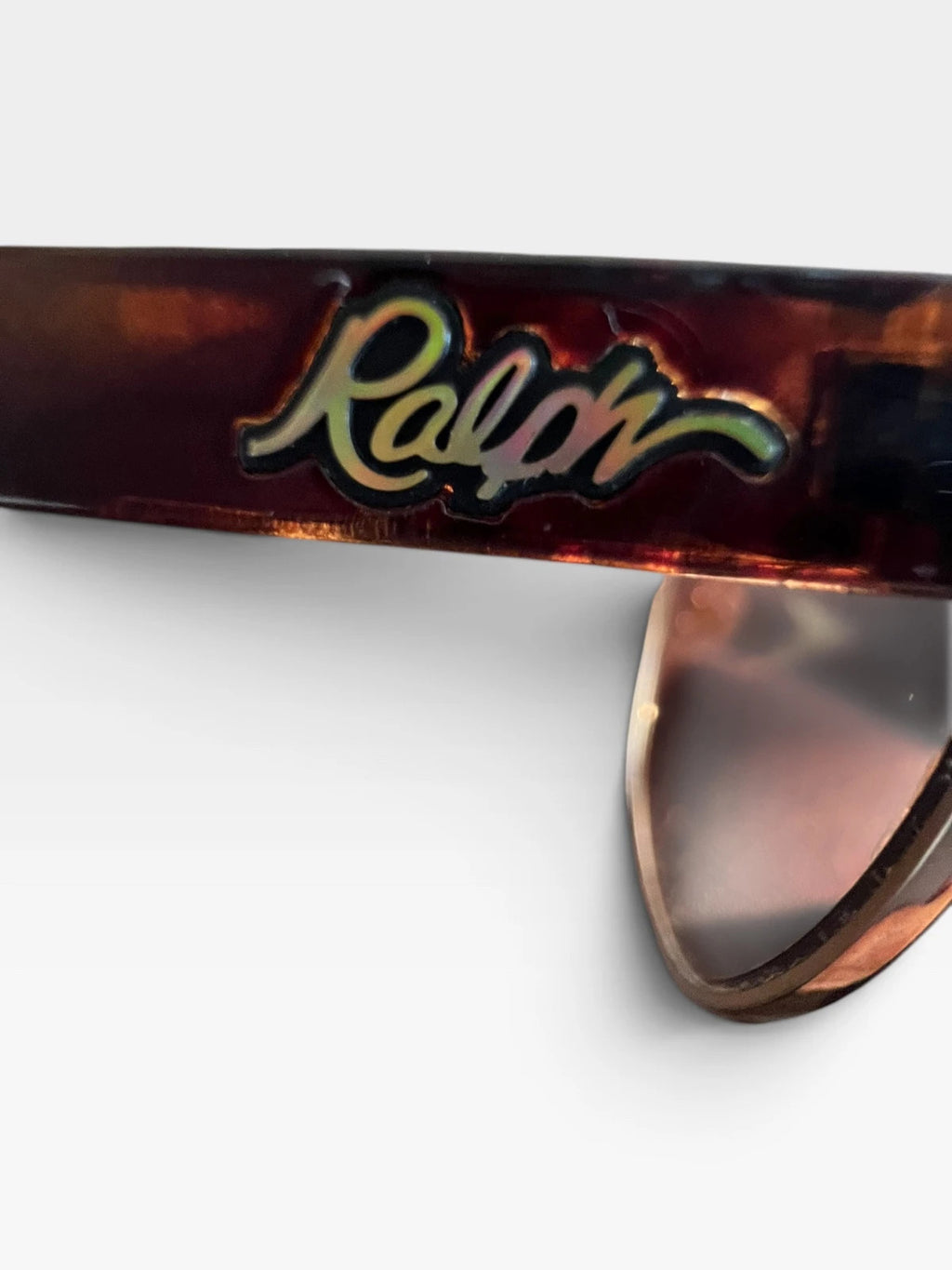 Ralph Lauren Cat Eye sunglasses brown lenses gold and brown frame with logo details.