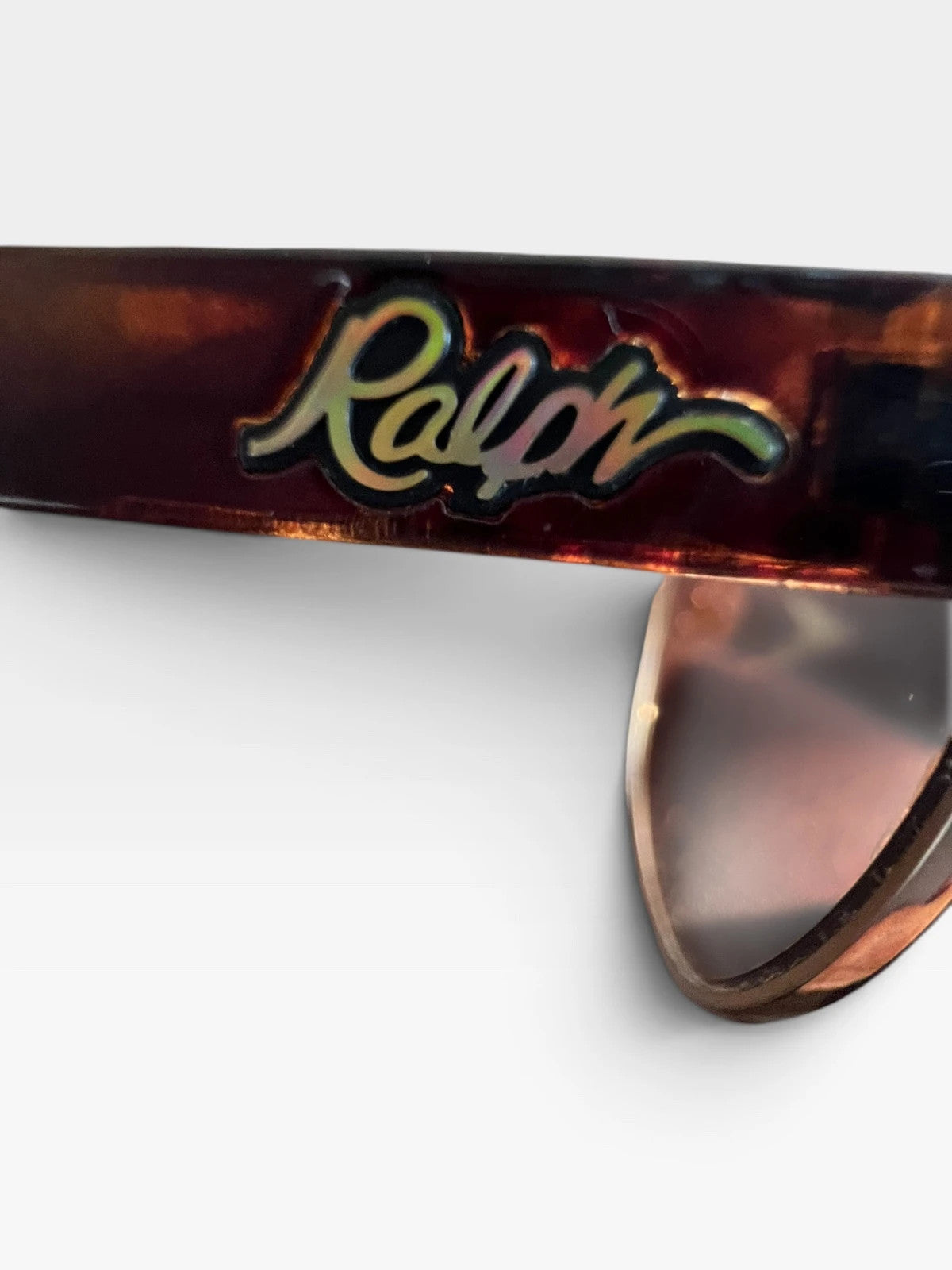 Ralph Lauren Cat Eye sunglasses brown lenses gold and brown frame with logo details.