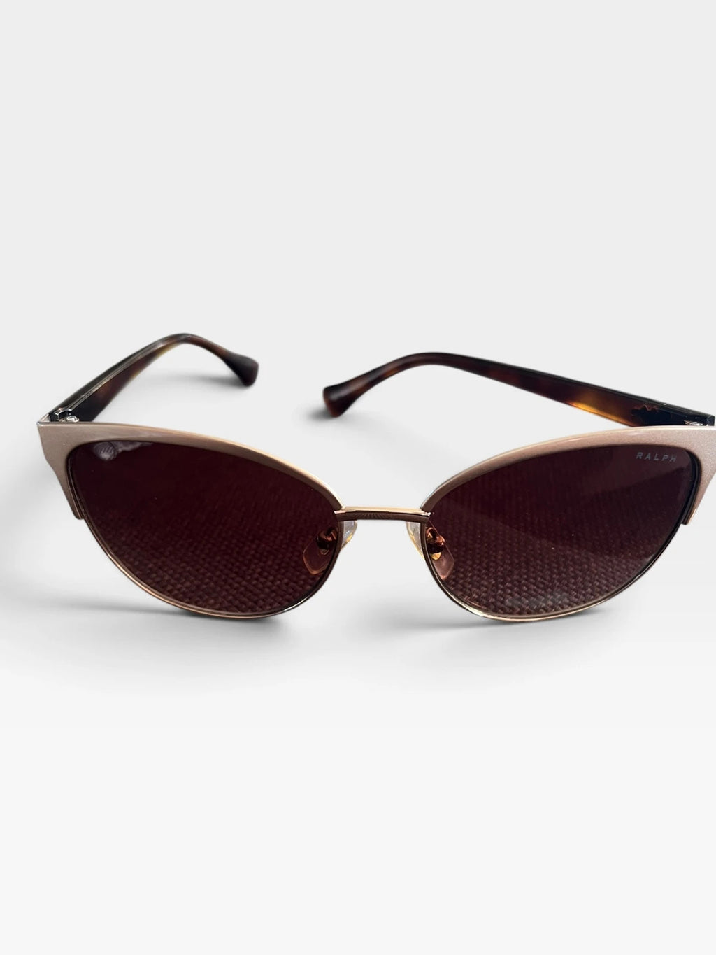 Ralph Lauren Cat Eye sunglasses brown lenses gold and brown frame with logo details.